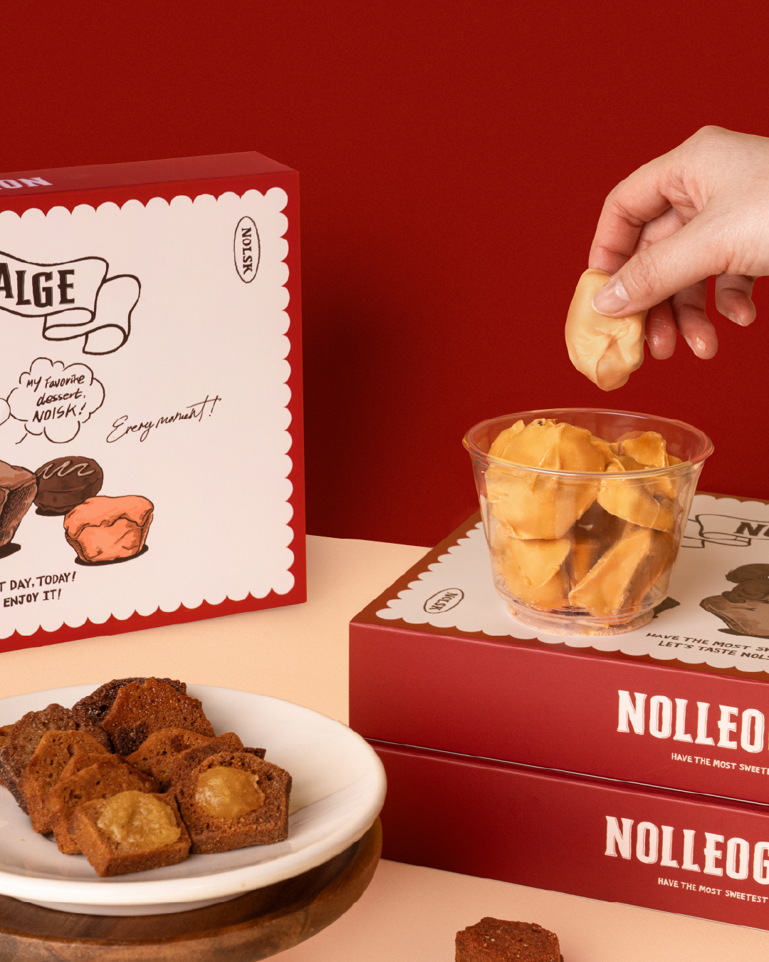 NOLSK gourmet financier rusks displayed with stylish red and white gift packaging